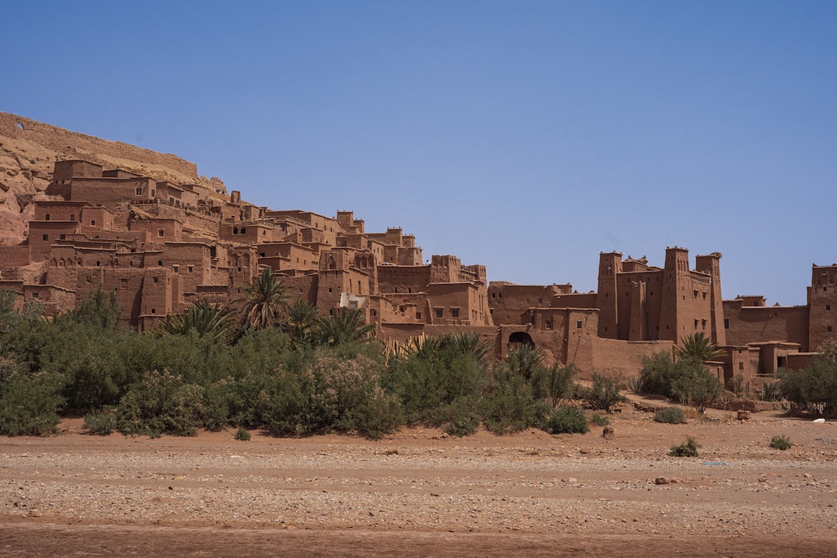 Ancient mud-brick village nestled in a desert landscape.