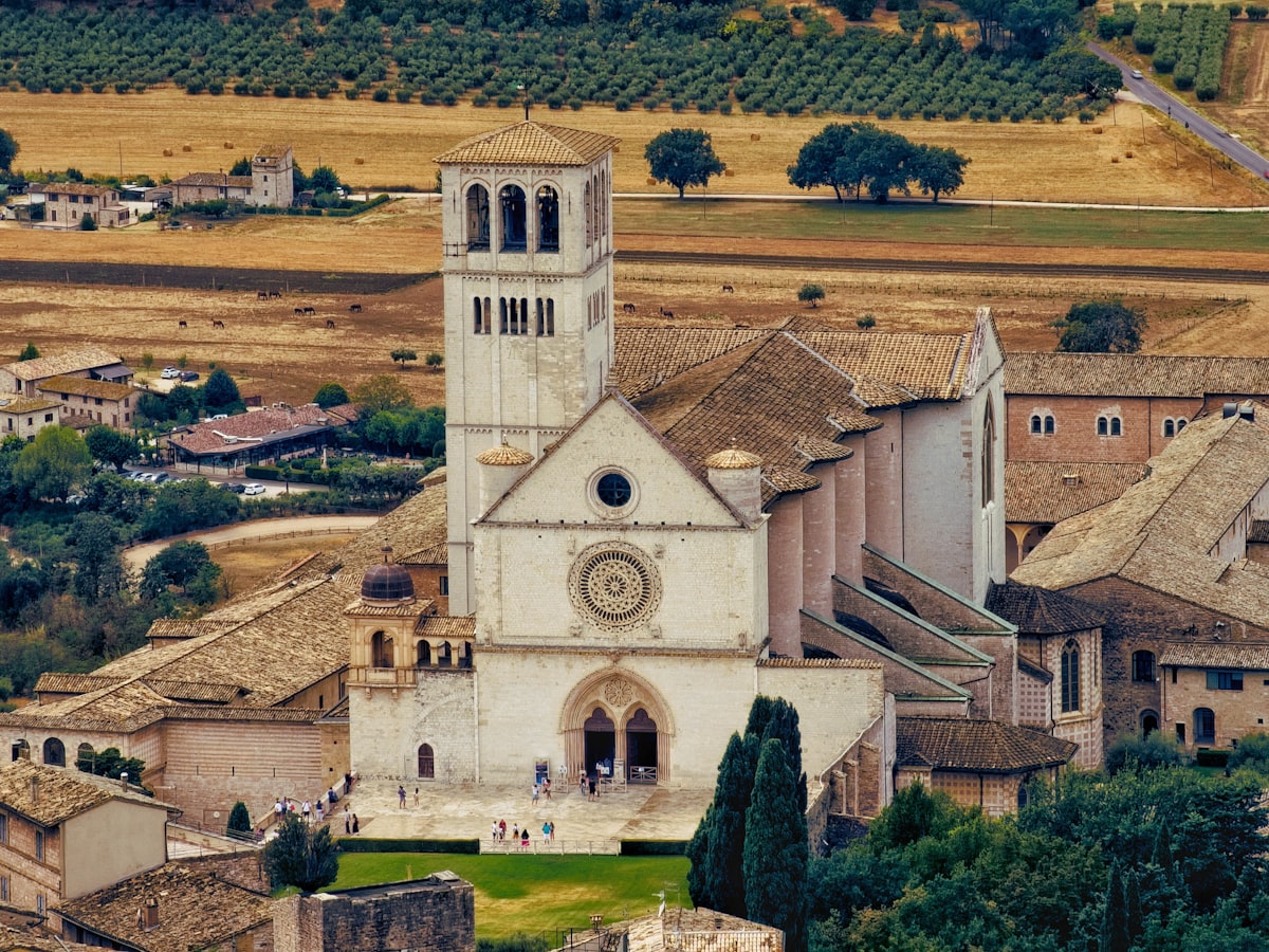 An aerial view of a small town with a church