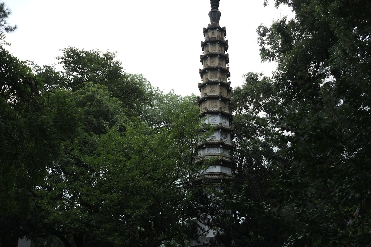 a tall tower with a clock on top of it