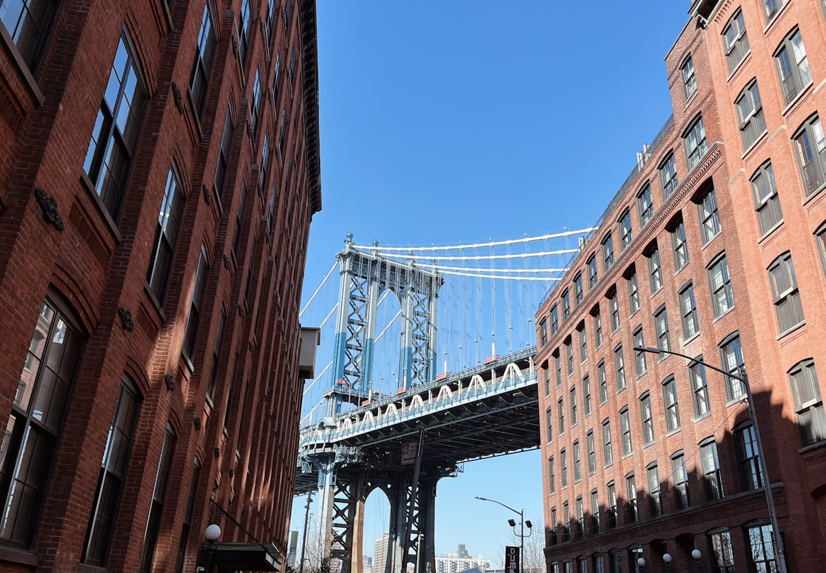 a view of a bridge over a city street
