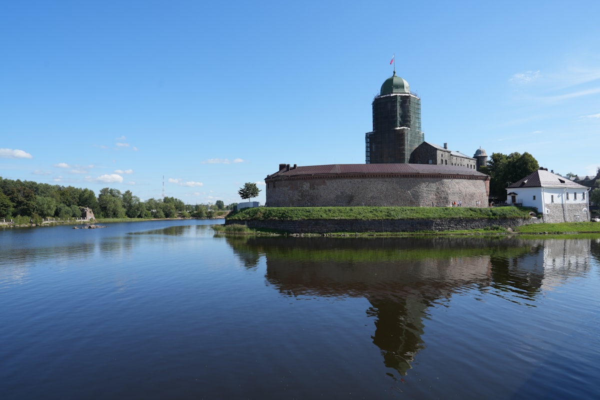 A body of water with a building in the middle of it