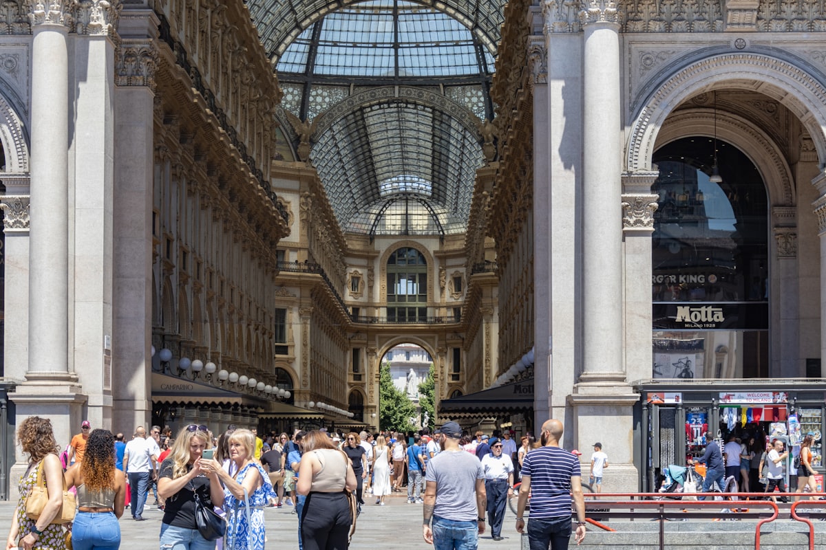a crowd of people in a large building