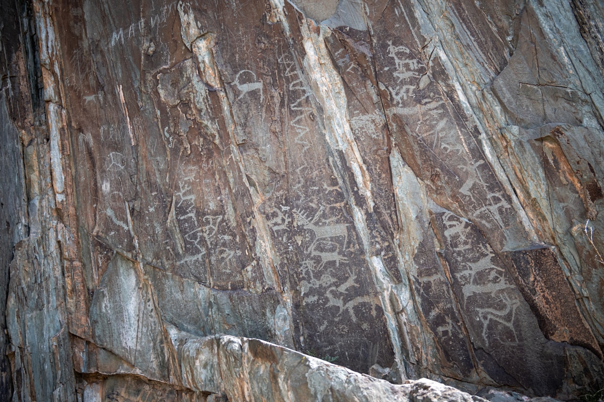 a large rock with some writing on it