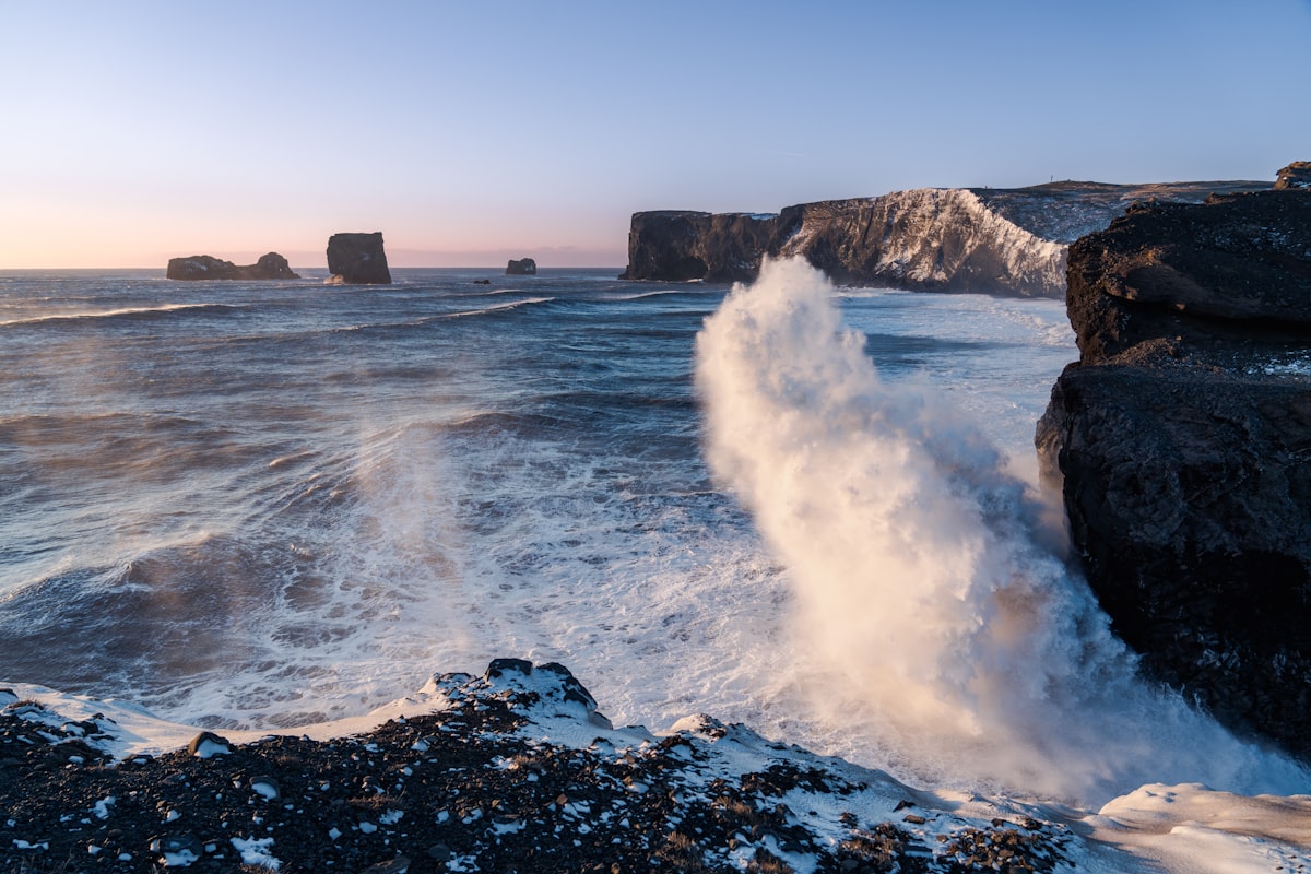 waves crashing against rocks
