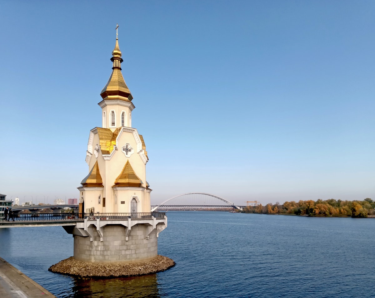 A large body of water with a church on top of it