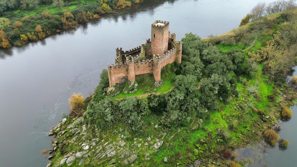 Castle ruins on a small island surrounded by water