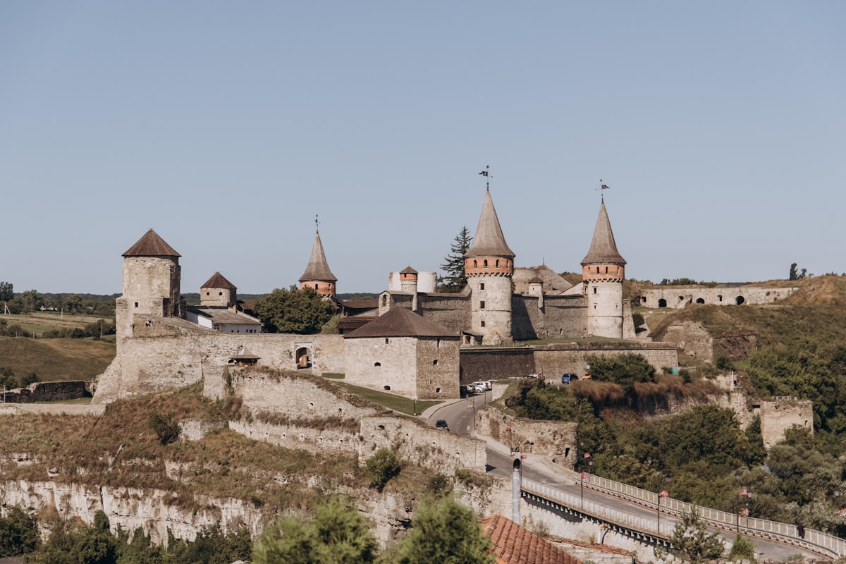 brown and white concrete building during daytime