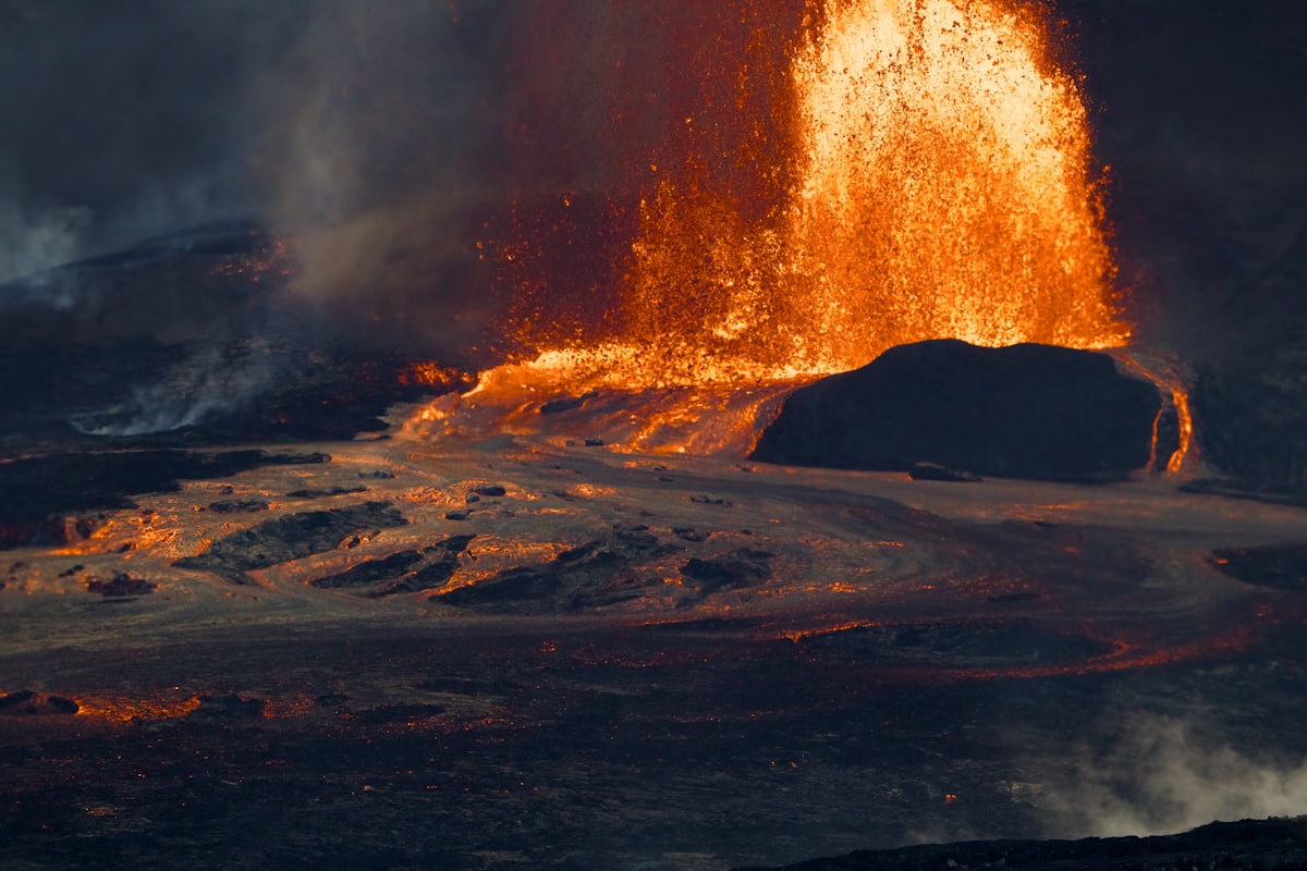 Fiery lava erupts from a volcano during an eruption.