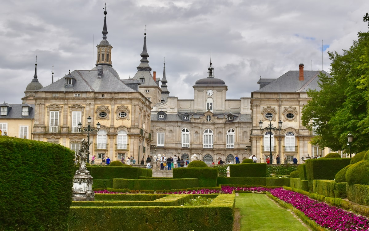 a large building with a fountain in front of it