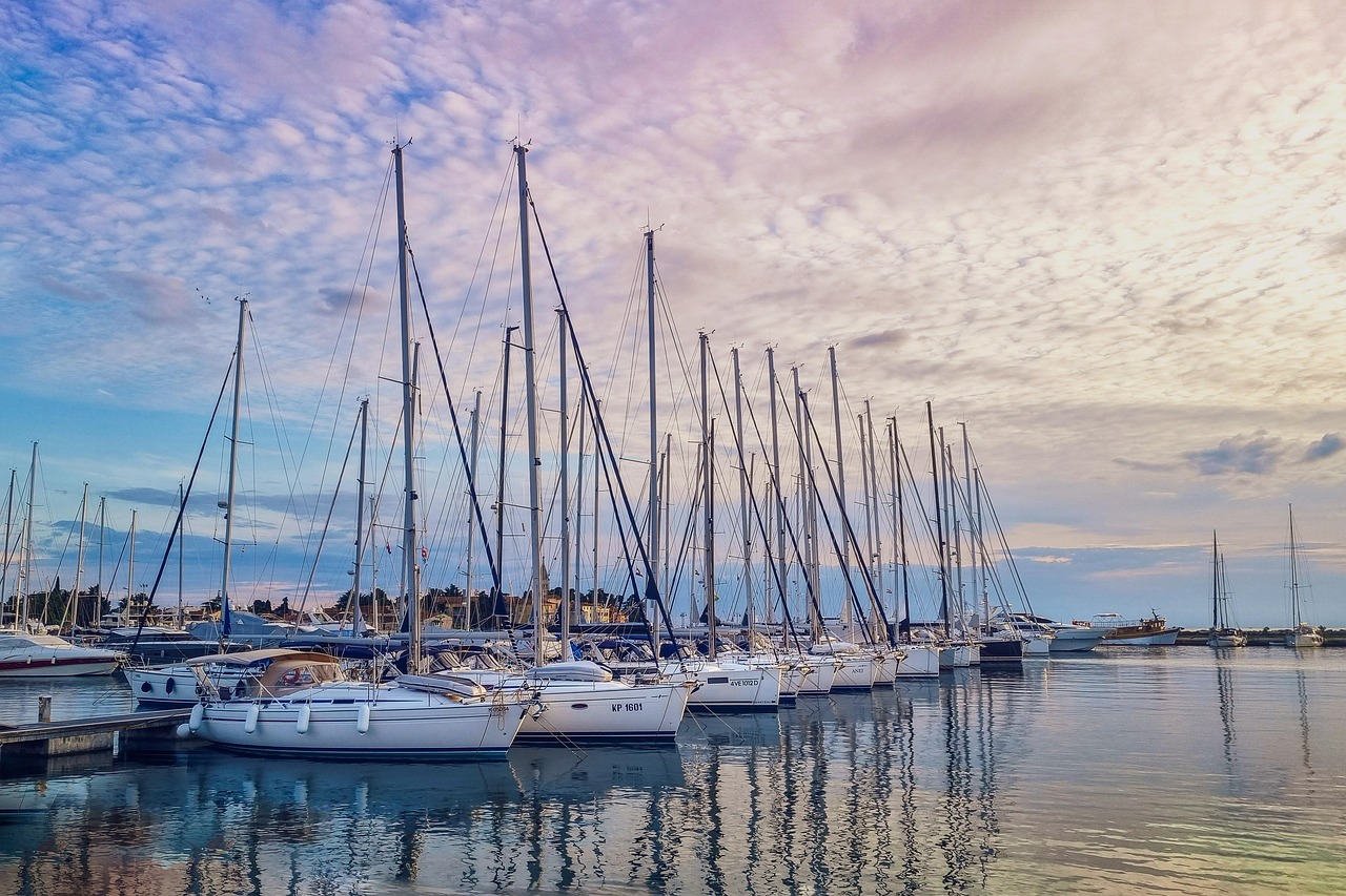 marina, sailboats, harbor, sunset, yachts, sea, sailing, nautical, boats, dock, reflections, peaceful, coastal, ocean view, nature, travel, summer, vacation, maritime, sky, tranquil, water, evening light, mooring, sailboat mast, leisure