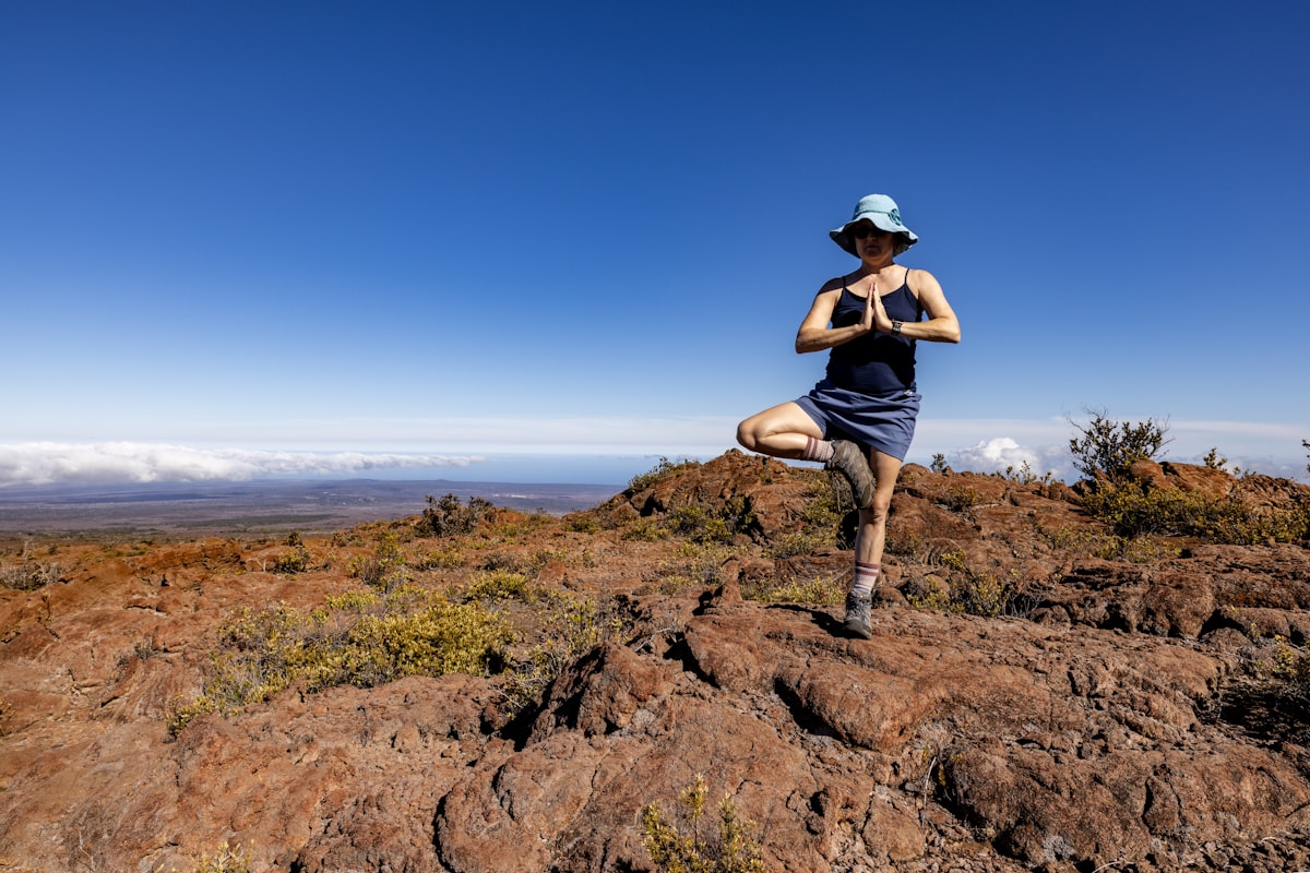 A man is running on top of a mountain
