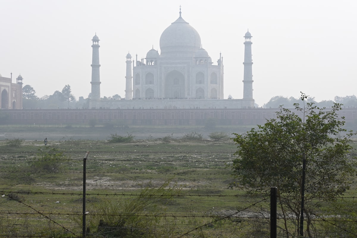a large building with towers and a dome
