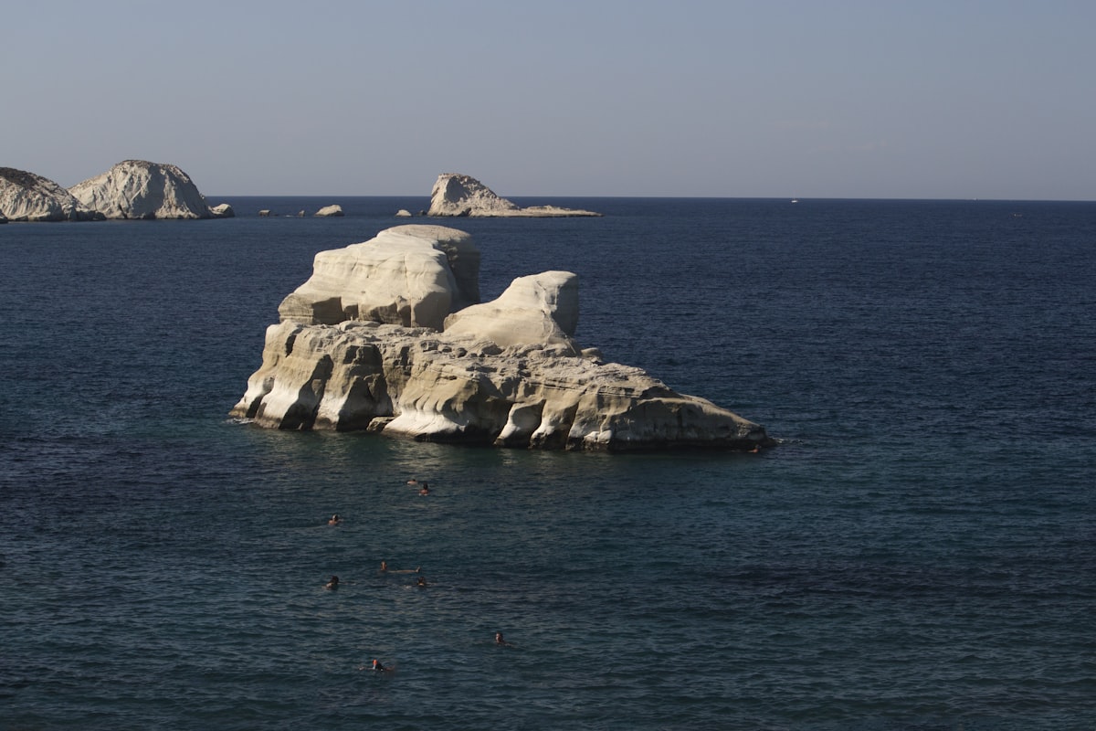 a body of water that has some rocks in it