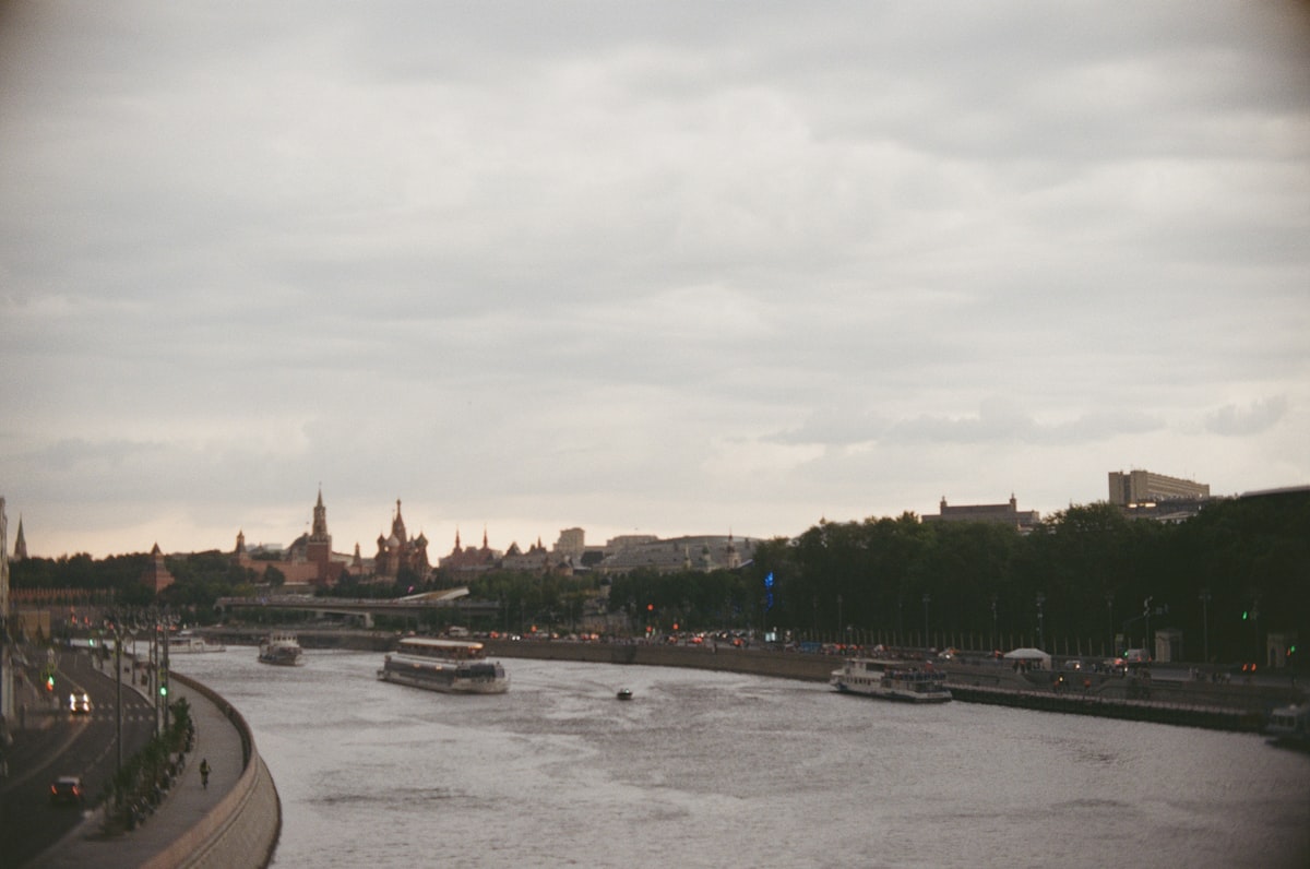 a body of water with boats floating on it
