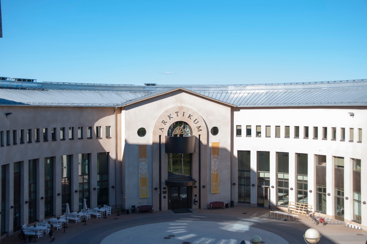 a building with a circular courtyard in front of it