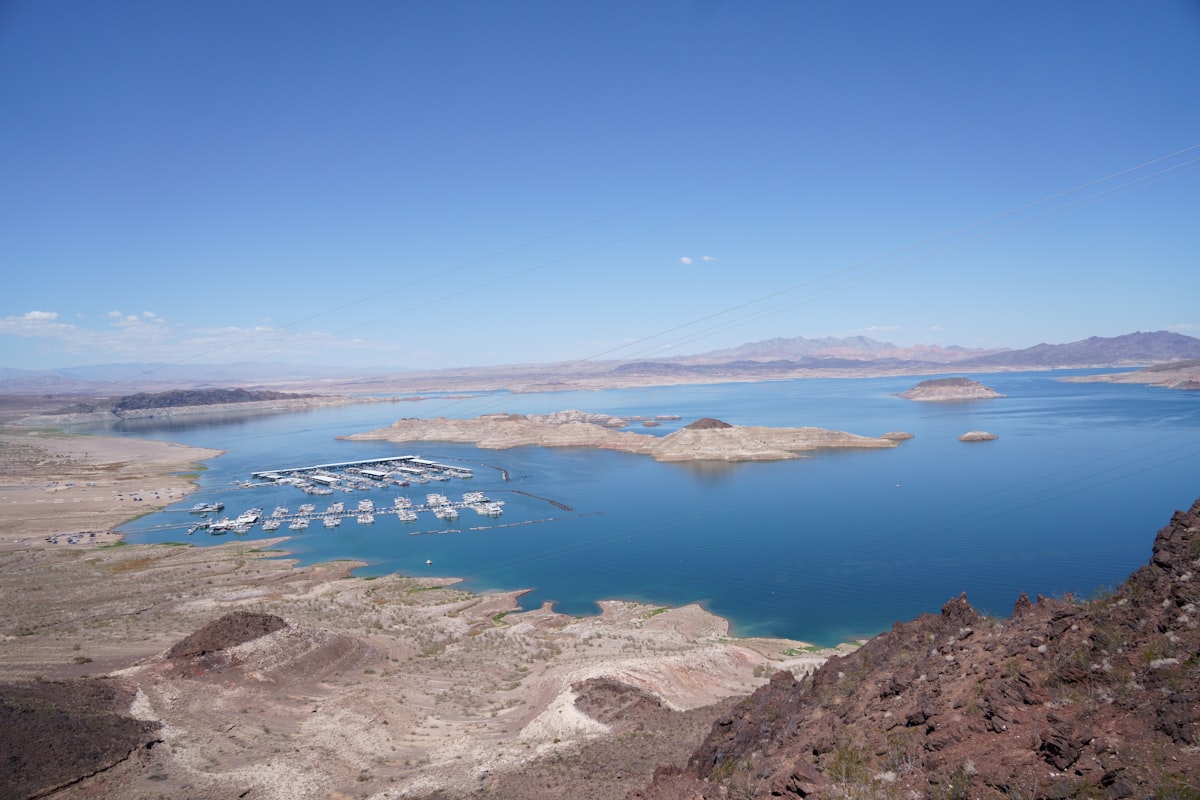 a body of water surrounded by land with Lake Mead in the background
