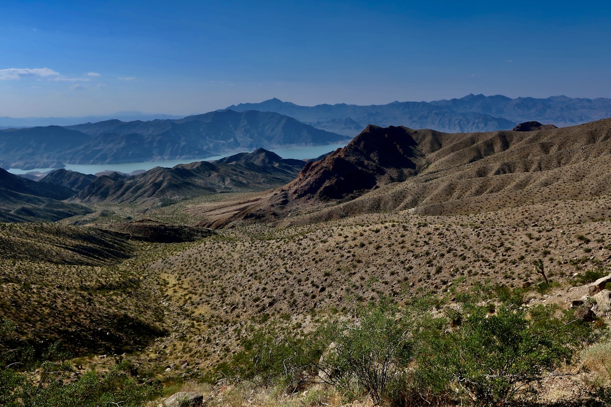 a view of a mountain range with mountains in the distance