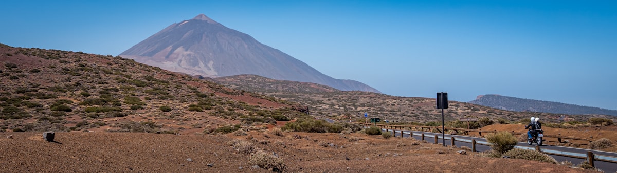 brown and white mountain under blue sky during daytime