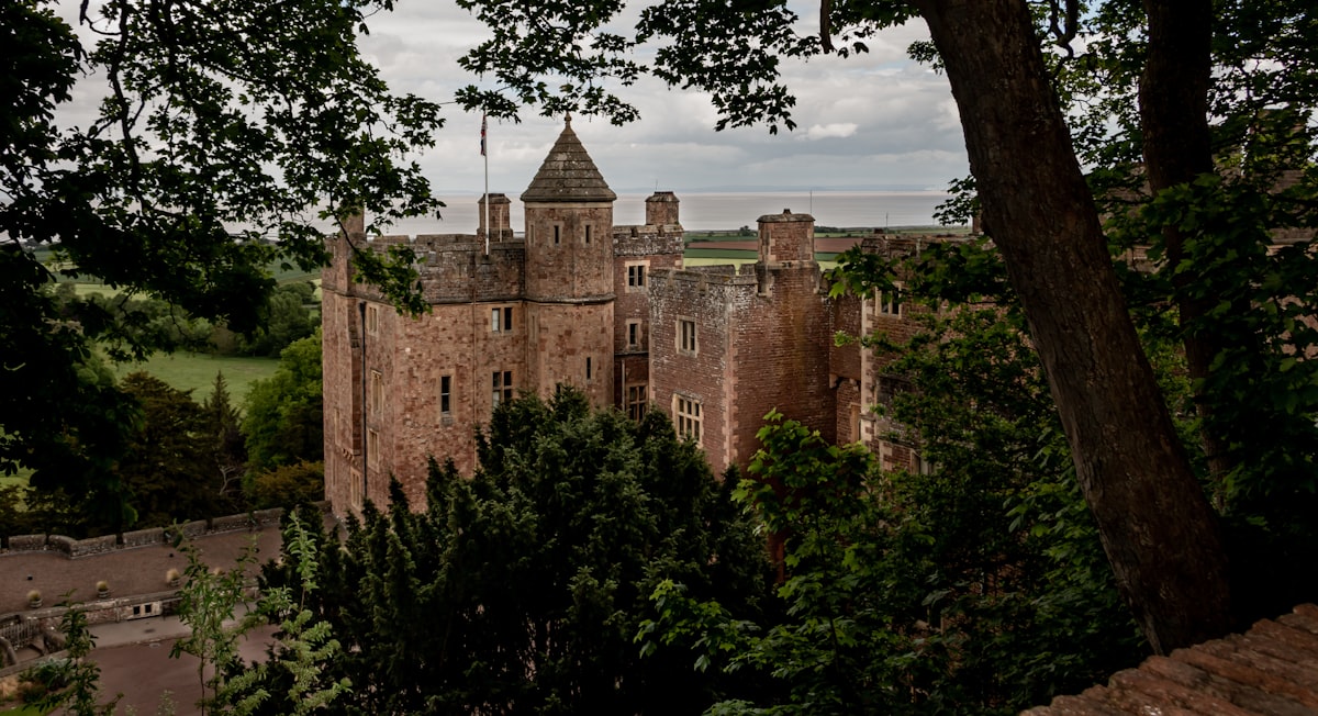 a castle with a tower and a clock on the top of it
