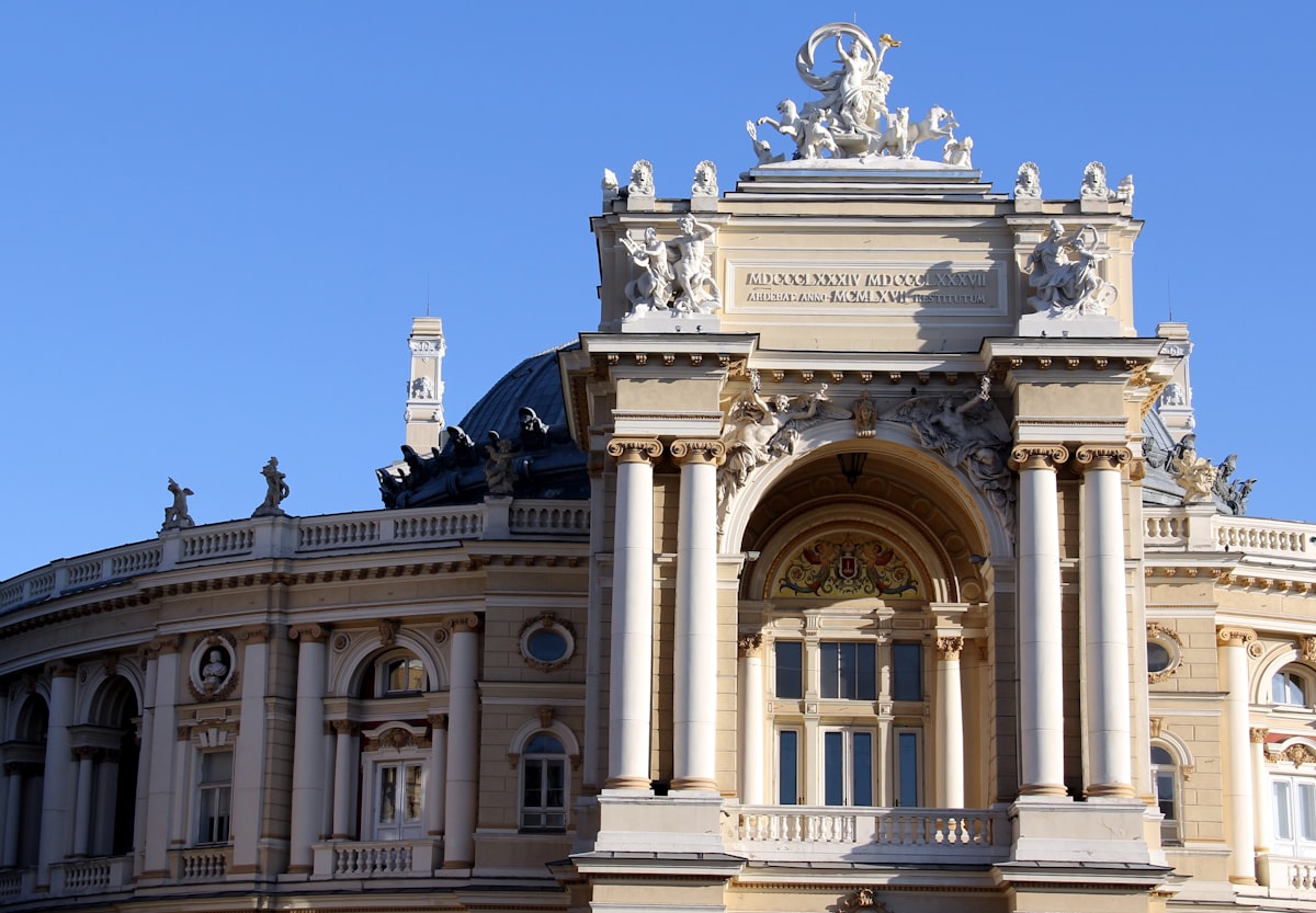 white concrete building under blue sky during daytime