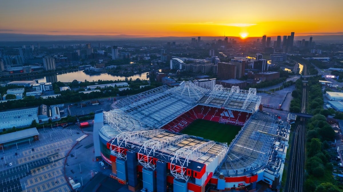 An aerial view of a soccer stadium at sunset