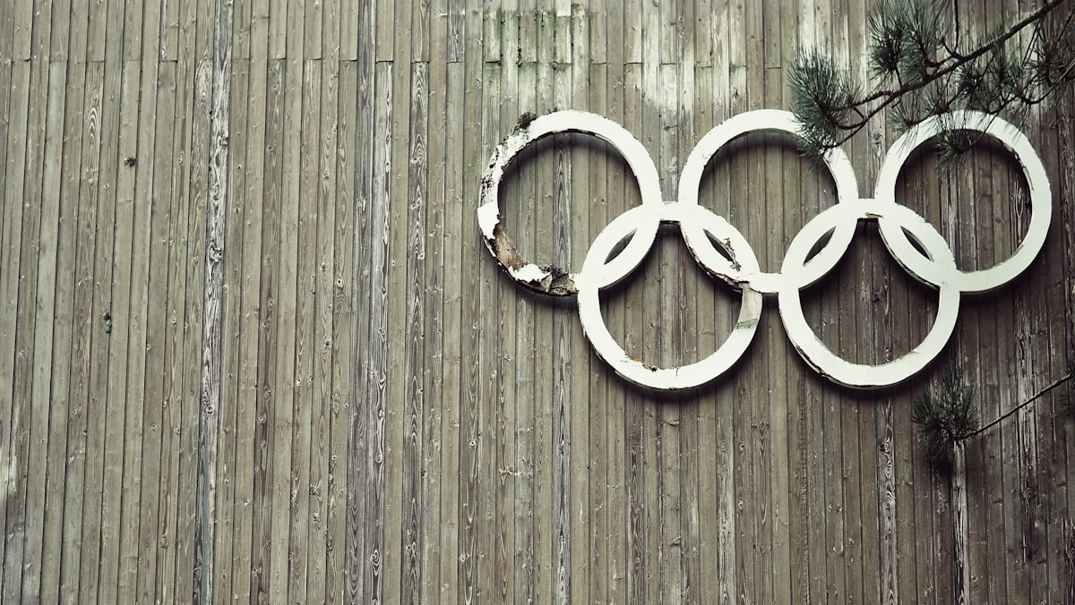 Olympic symbols on wooden wall