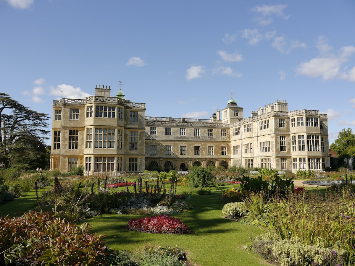 A large building with a garden in front of it