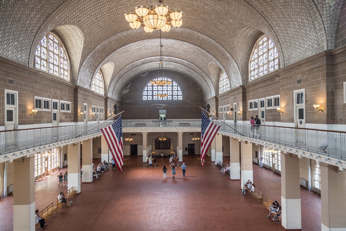 a large building with a flag hanging from the ceiling