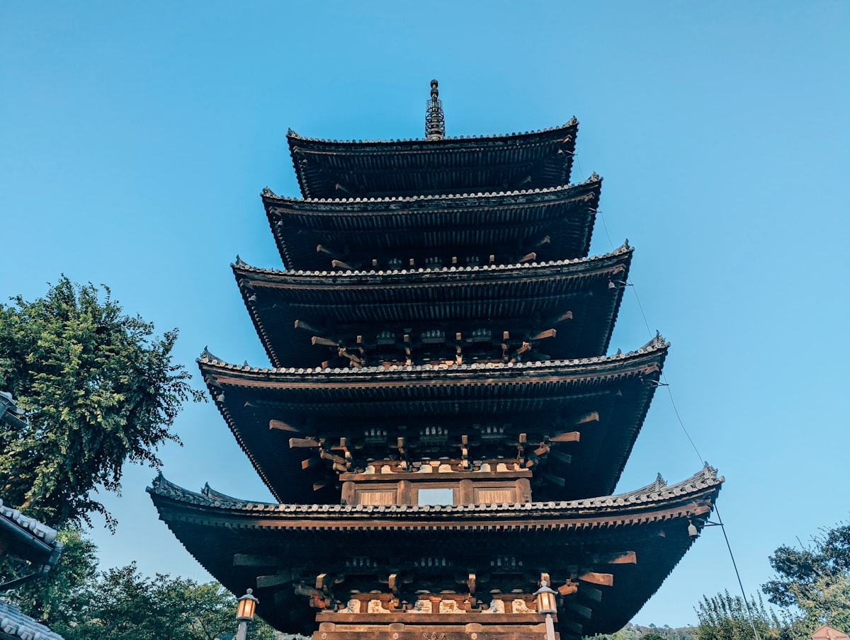 A tall building with a tower in the middle of it