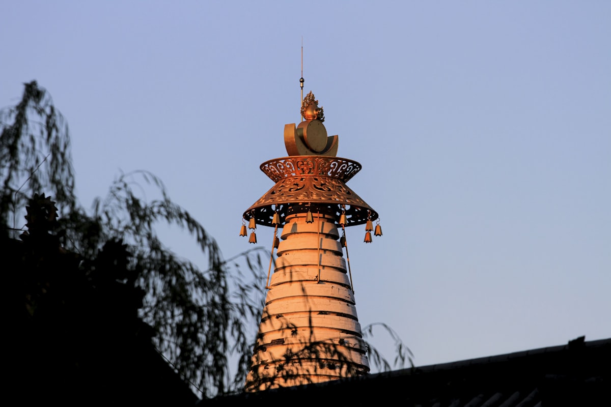 a tall tower with a sign on it
