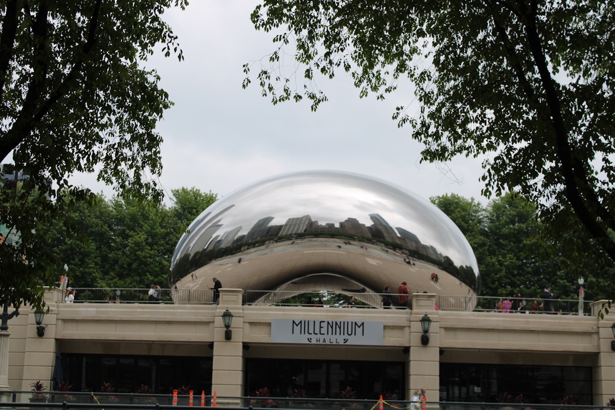 a large metal ball sitting on top of a building
