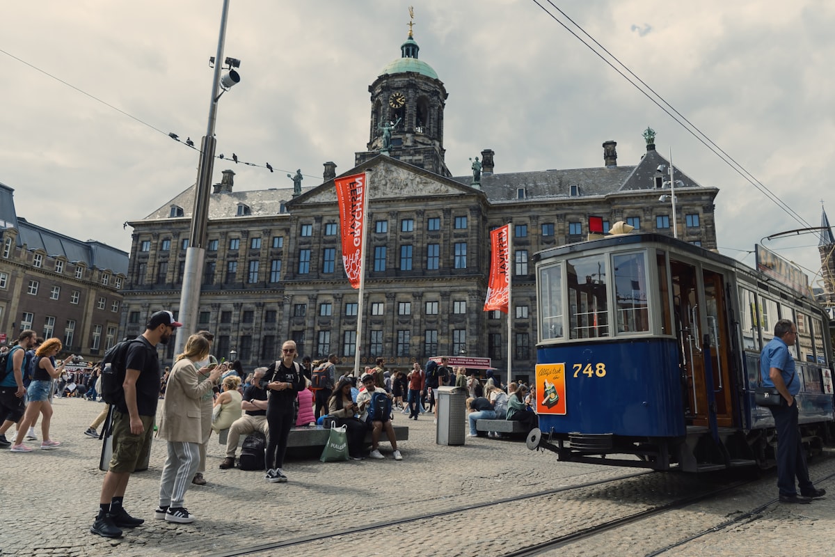 a group of people standing outside of a building