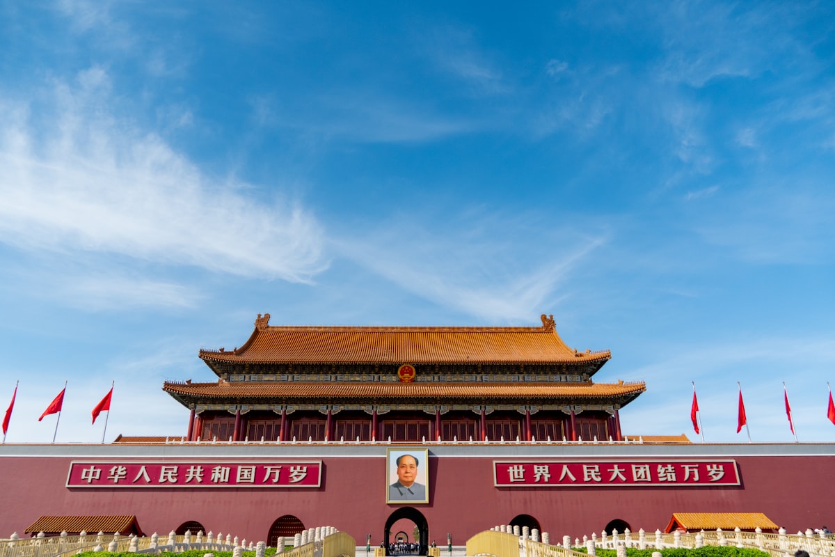 a building with flags on the roof