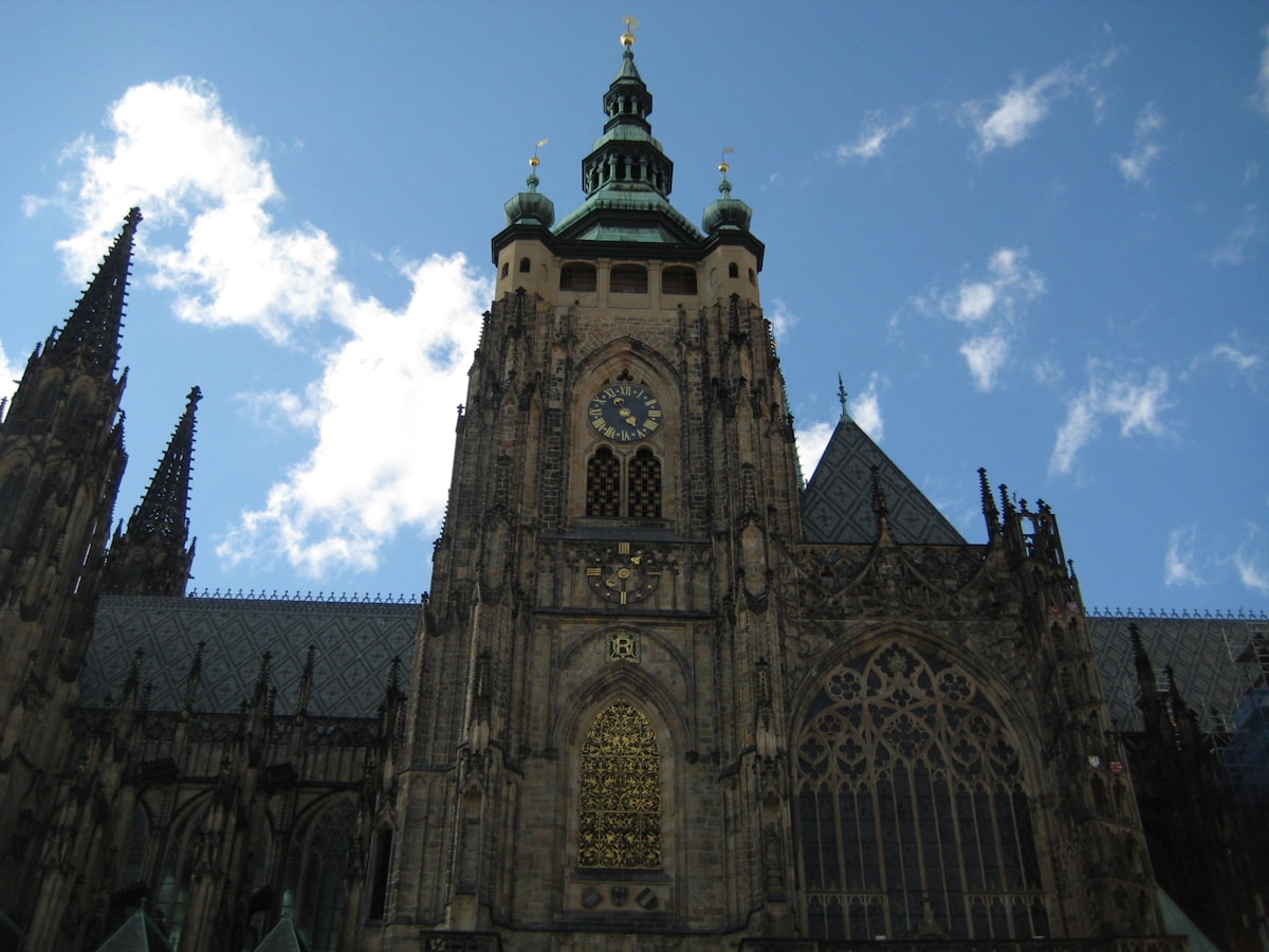 a very tall building with a clock on it's side