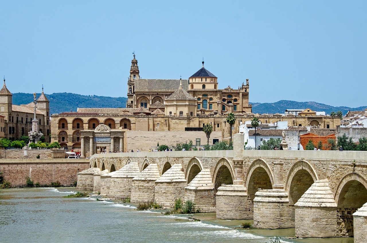 spain, andalusia, province of cordoba, nature, cordoba, province, city, historic centre, historic center, mezquita-catedral de cordoba, cordoba cathedral mosque, cathedral, mosque, religion, puente romano, puente viejo, bridge roman, historical, guadalquivir, flow, water, heaven, blue, to travel, tourism, sightseeing