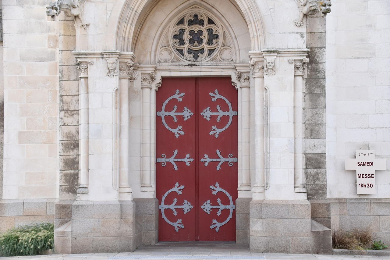 church of saint martin, religious building, confession catholic, red portal, sculpture stone, religion, heritage, la chapelle basse-mer, loire atlantique, historical