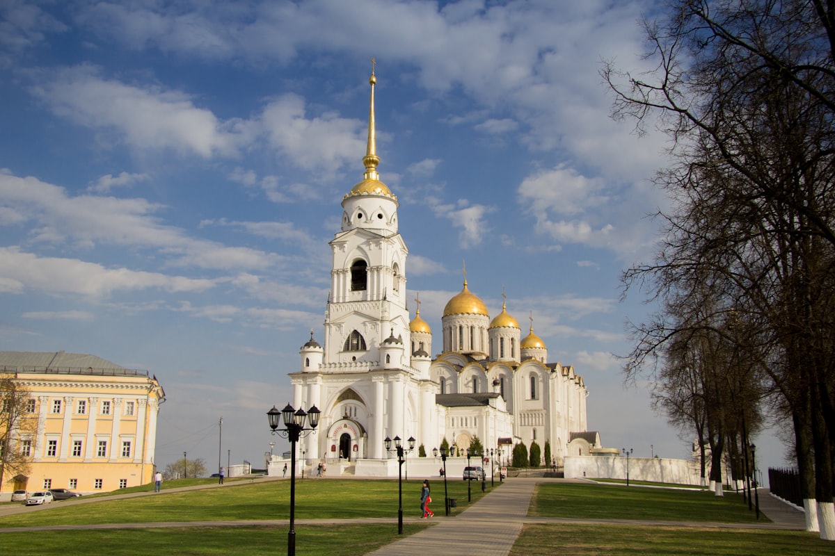 white concrete building under blue sky during daytime