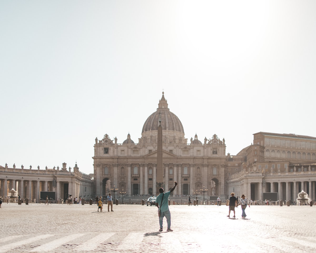 A group of people standing in front of a building