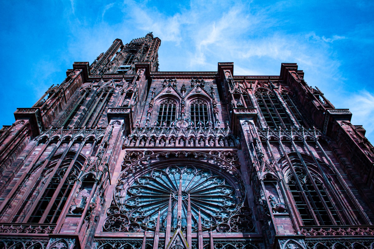 Gothic cathedral facade with intricate stonework and rose window