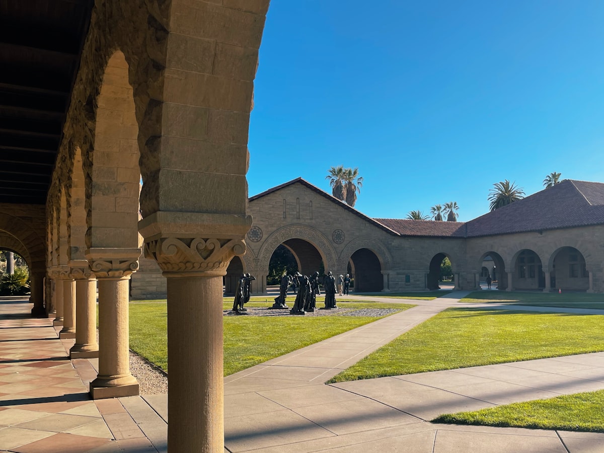 a group of people standing in front of a building