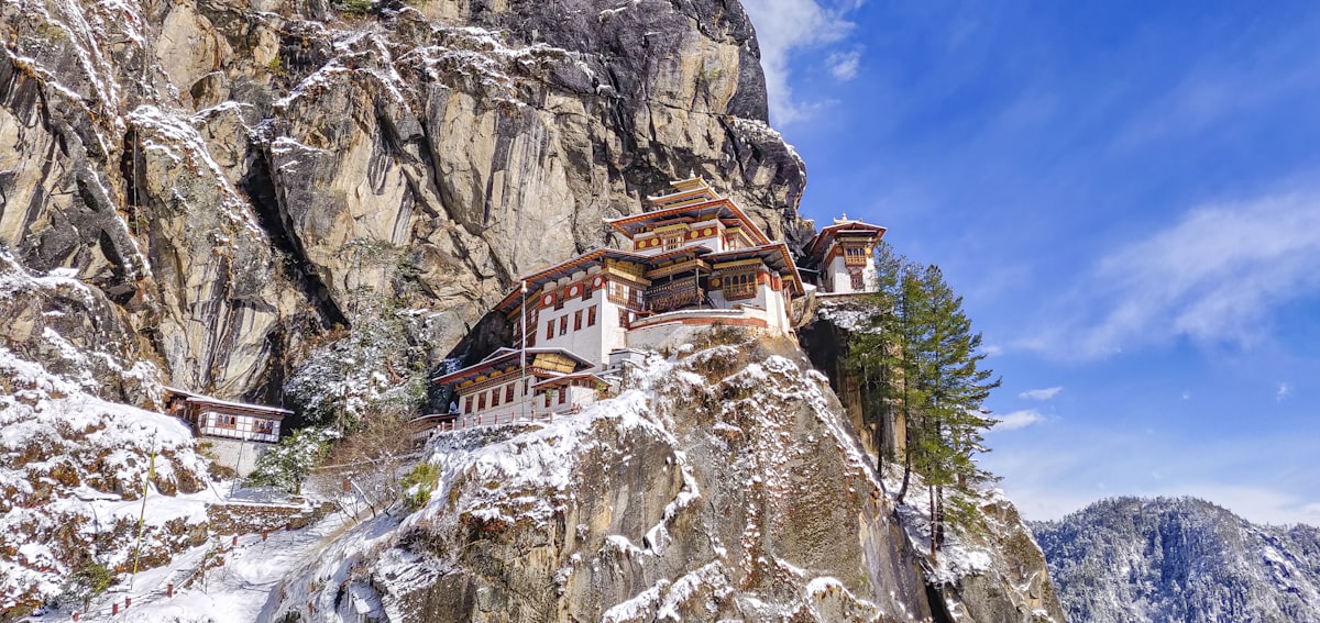 Monastery clinging to a snowy cliff face