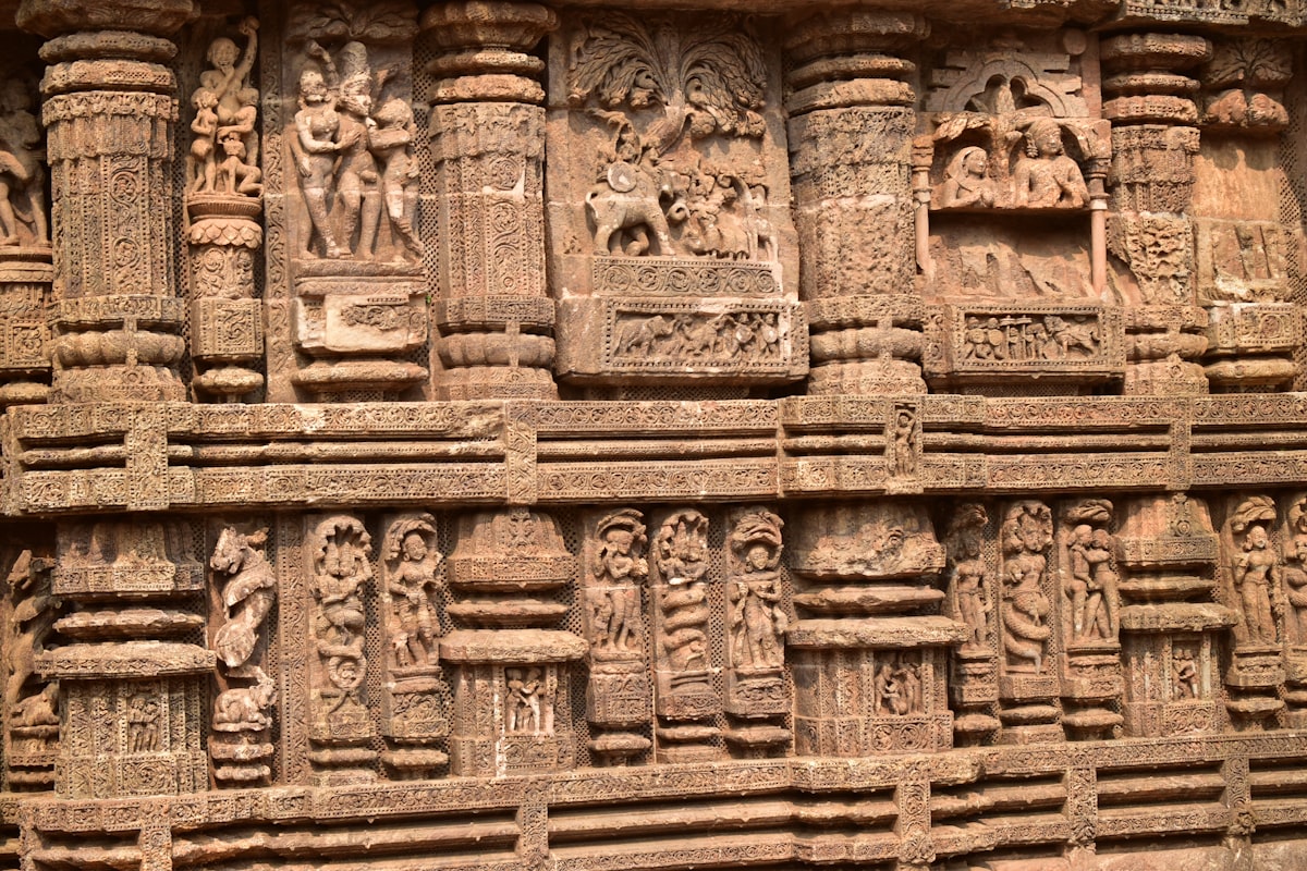 Intricate stone carvings on an ancient temple wall.