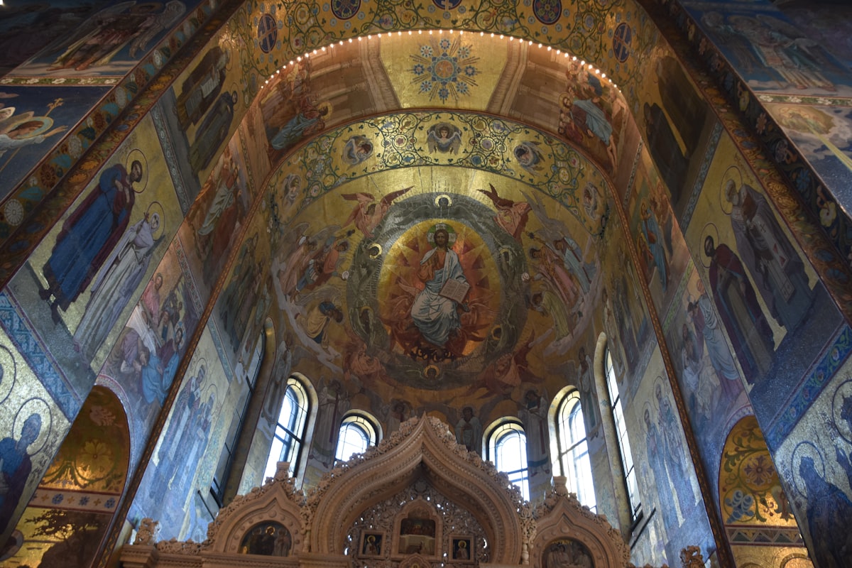 a church with a large painting on the ceiling