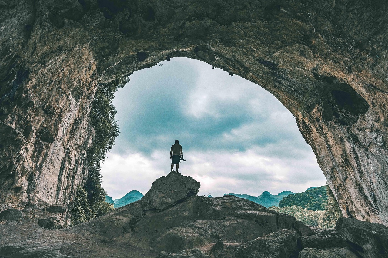 man, cave, standing, rocks, guy, cave opening, sky, clouds, nature, landscape, cave, cave, cave, cave, cave, cave opening, cave opening