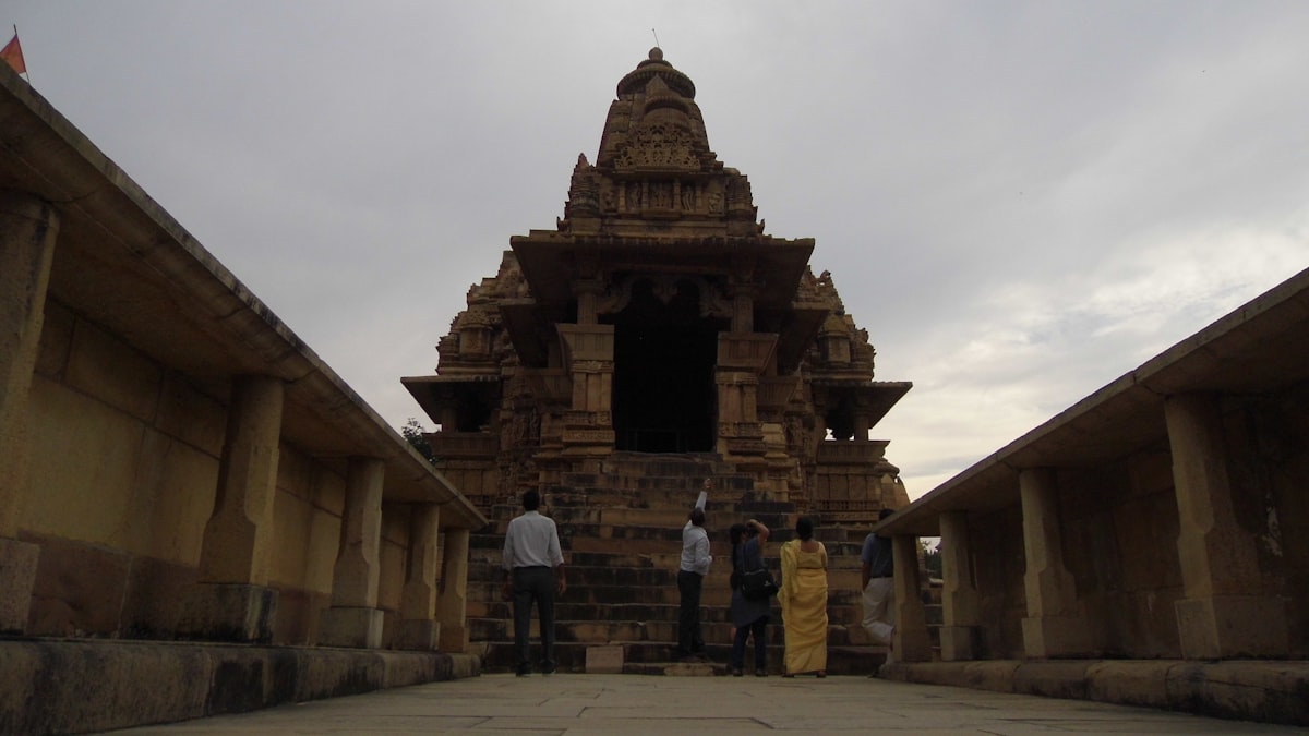 a group of people standing outside a building