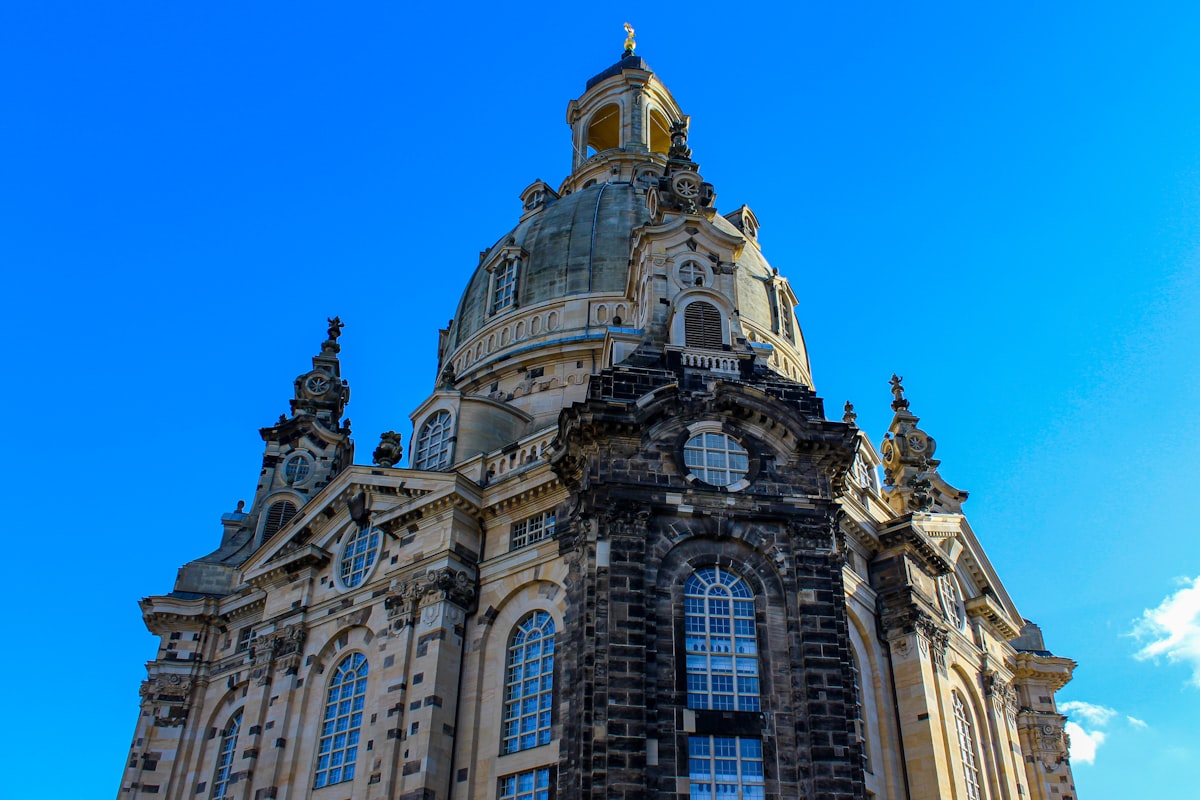 a tall building with a clock on the top of it