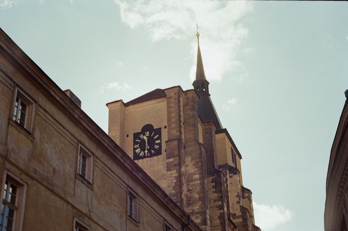 brown concrete building under blue sky during daytime