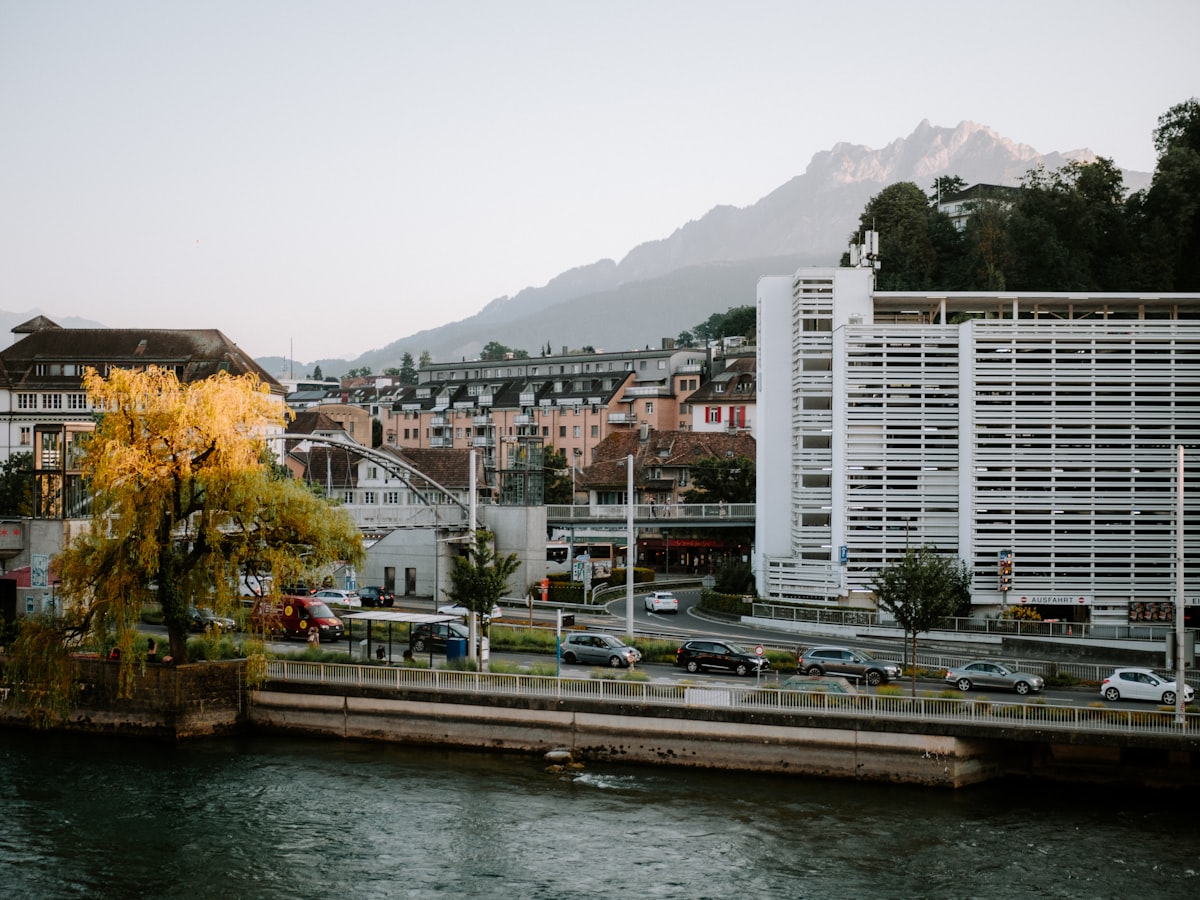 A river running through a city next to tall buildings