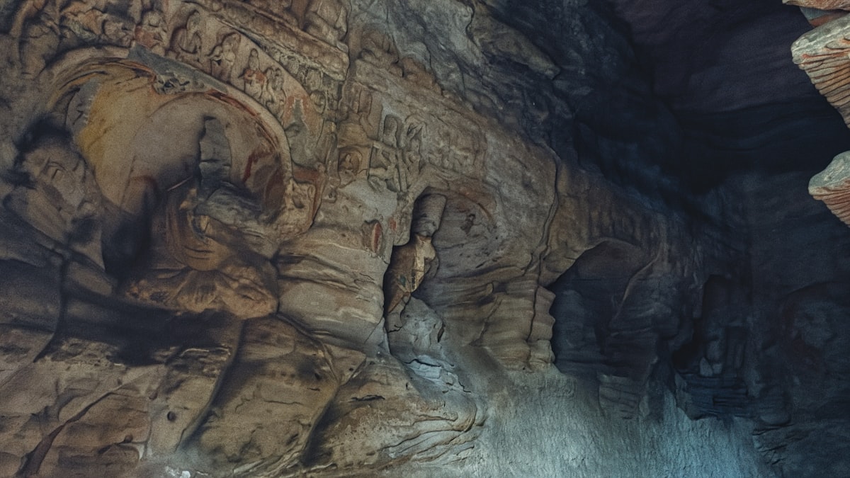 Intricate rock formations inside a dark cave