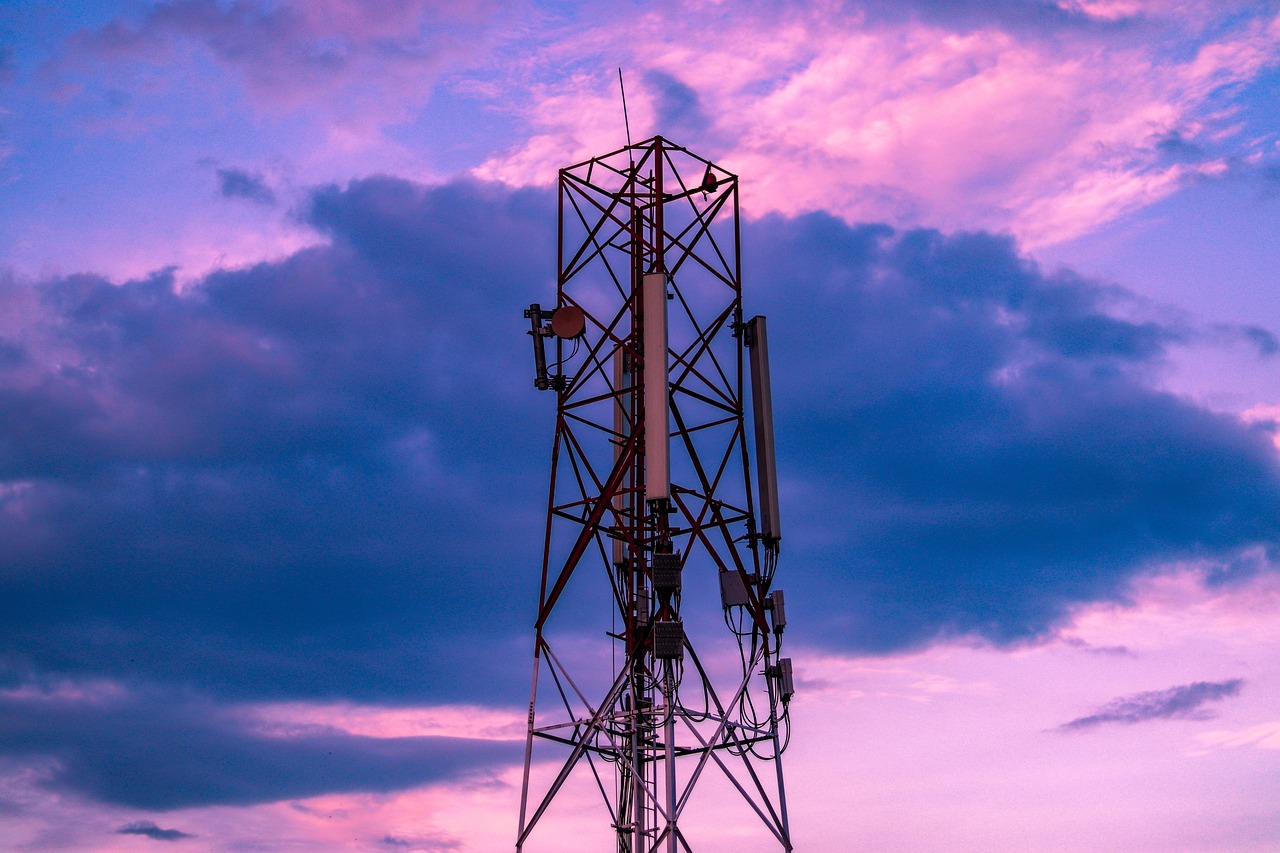 telecommunications tower, sky, cloudy sky, cell tower, communication tower, radio tower, tower, nature, structure, twilight, dark clouds, dark